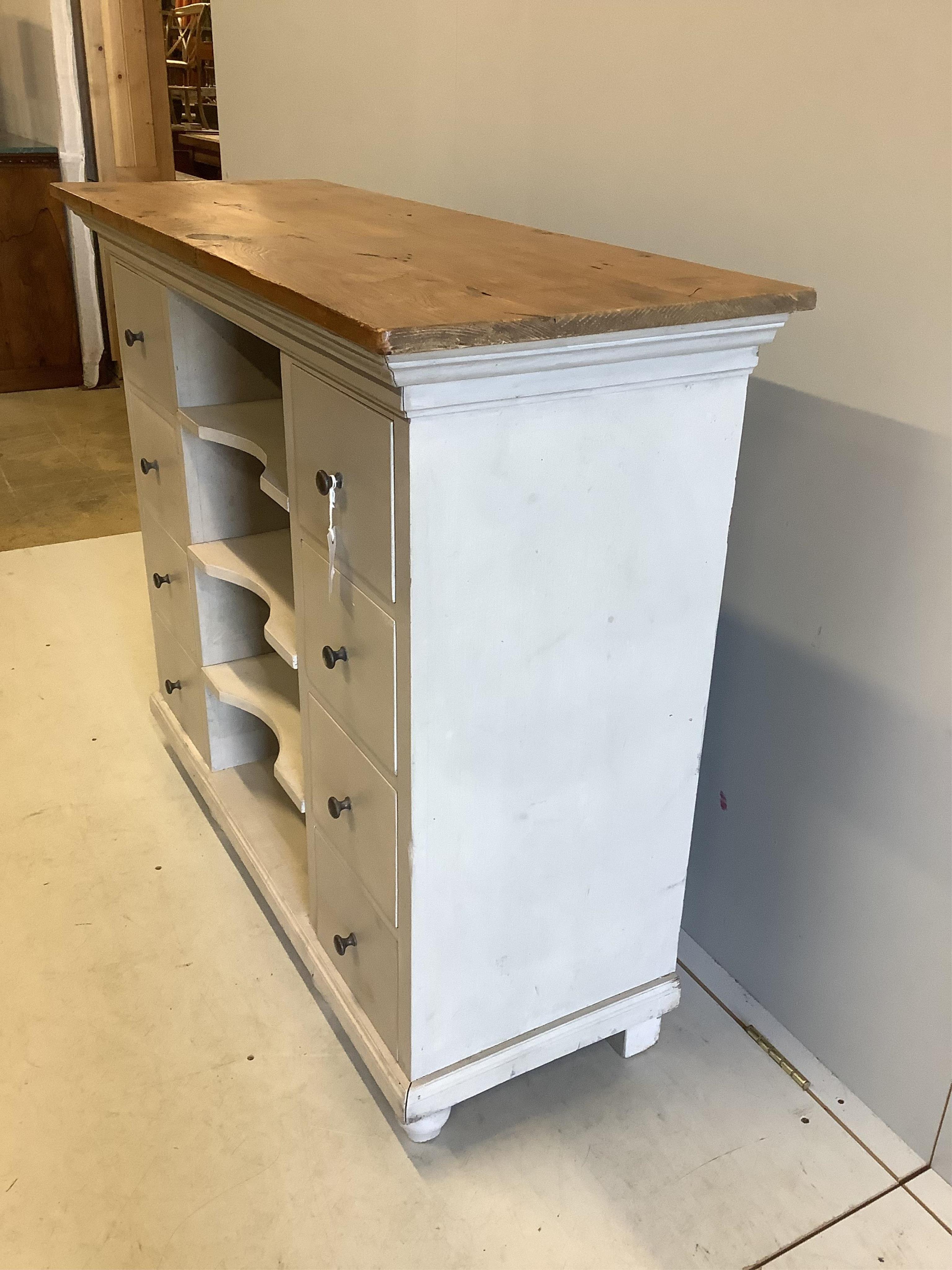 A painted pine eight drawer side cabinet, width 116cm, depth 43cm, height 97cm. Condition - fair to good